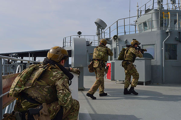 Royal Marines with 42 Commando secure a ship