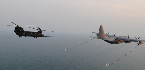 Chinook refueling in flight from Hercules