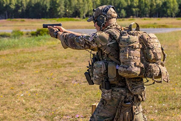 British army sniper with L131A1 glock pistol