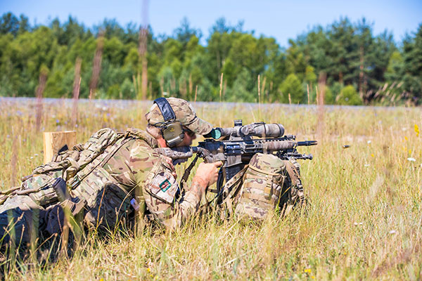 L129a1 rifle being fired from prone