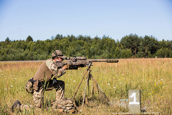 L115A3 sniper rifle being fired mounted on a stand by British Army sniper