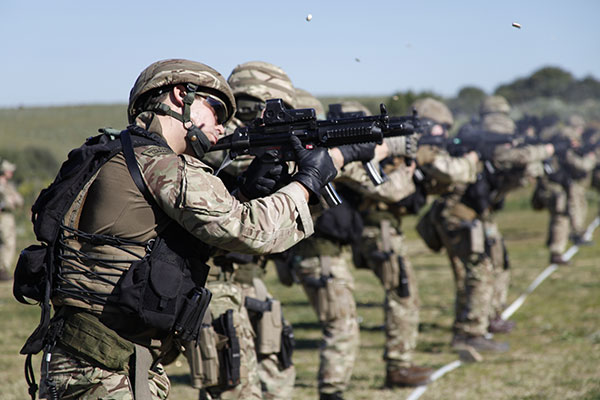 Royal Marines firing MP5A3